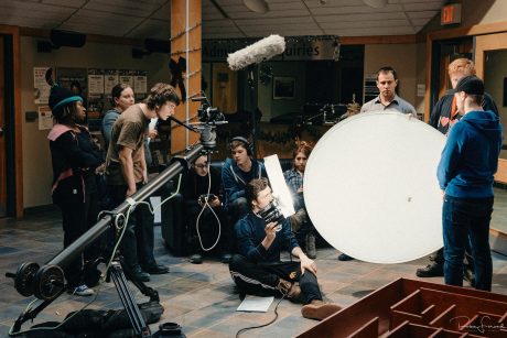 film students on the set of a video production job